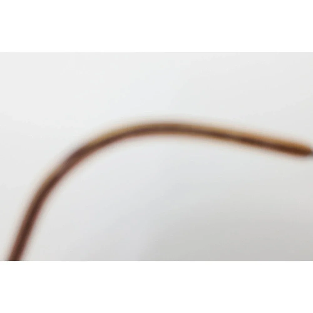 Marchon Airlock 760 Bronze Rimless Oval Eyeglasses Frames 56-19-135 Minimalist